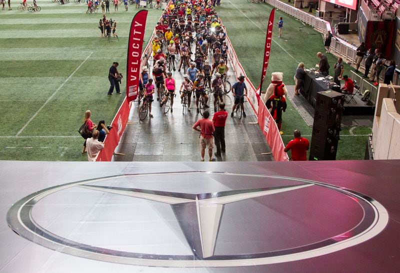 Cyclists wait to start one of the races during the first annual VeloCity that began at Mercedes-Benz Stadium in Atlanta on Saturday, May 5, 2018. The proceeds from the event benefit Grady Memorial Hospital. (REANN HUBER/REANN.HUBER@AJC.COM)