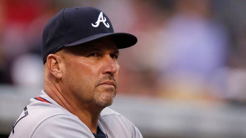 John Hart knows that Braves manager Fredi Gonzalez has dealt with a difficult situation this season. (AP photo)