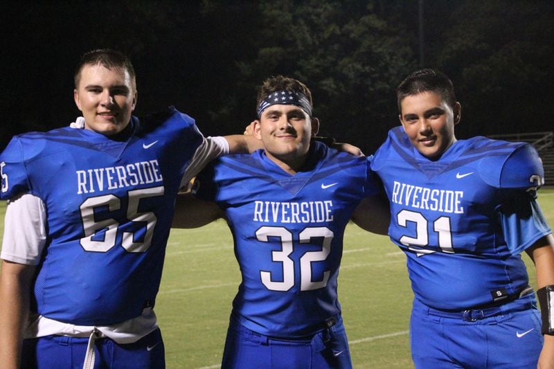 From left: Riverside Military Academy football players Wylie McDonald, Nick Haley and Ridley McDonald pose for a picture. Wylie McDonald is one of the 18 seniors who transferred from Riverside once he learned the football season was canceled.