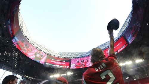 September 17, 2017 Atlanta: Colton Holder, Snellville, waves his cap beneath the open roof of Mercedes-Benz Stadium as the Falcons prepare to play the Packers in a NFL football game on Sunday, September 17, 2017, in Atlanta.    Curtis Compton/ccompton@ajc.com
