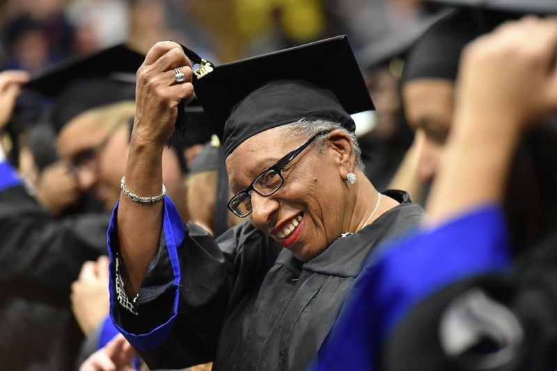 Mae Brown, 67, moves her tassel during the fall 2017 commencement at Georgia State University’s Perimeter campus on Tuesday, Dec. 12, 2017. HYOSUB SHIN / HSHIN@AJC.COM