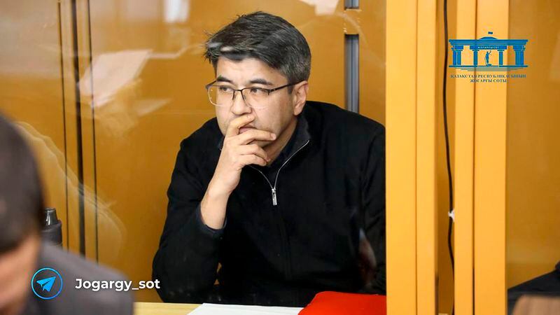 In this photo released by the Kazakhstan Supreme Court Press Office’s Telegram channel on Friday, April 12, 2024, businessman Kuandyk Bishimbayev, the country’s former economy minister, sits in a defendants’ cage at his trial in Astana, Kazakhstan. Bishimbayev is on trial for killing his wife, Saltanat Nukenova, and the case has touched a nerve in the Central Asian country, with tens of thousands of people signing petitions calling for harsher penalties for domestic violence. On April 11, senators approved a bill toughening penalties for spousal abuse, and President Kassym-Jomart Tokayev signed the measure into law four days later. (The Kazakhstan Supreme Court Press Office Telegram channel via AP)