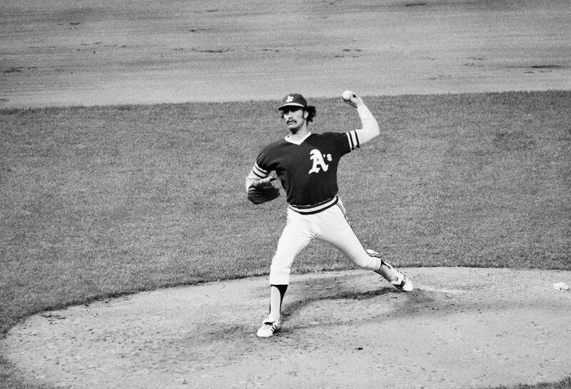 FILE - Oakland Athletics Pitcher Ken Holtzman gets the ball off in sixth inning of a baseball game against the New York Yankees at Yankee Stadium, June 1, 1973, New York. Holtzman, who pitched two no-hitters for the Chicago Cubs and helped the Oakland Athletics win three straight World Series championships in the 1970s, has died, the Cubs announced Monday April 15, 2024, on social media. (AP Photo/Dave Pickoff, File)