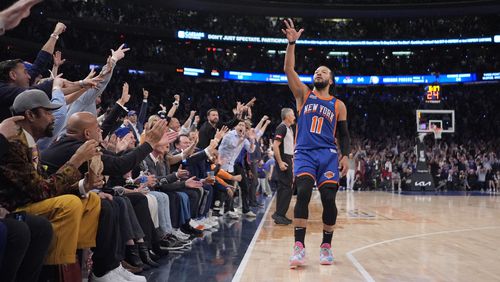 New York Knicks' Jalen Brunson (11) gestures to fans after making a three-point shot during the second half of Game 5 in an NBA basketball second-round playoff series against the Indiana Pacers, Tuesday, May 14, 2024, in New York. The Knicks won 121-91. (AP Photo/Frank Franklin II)