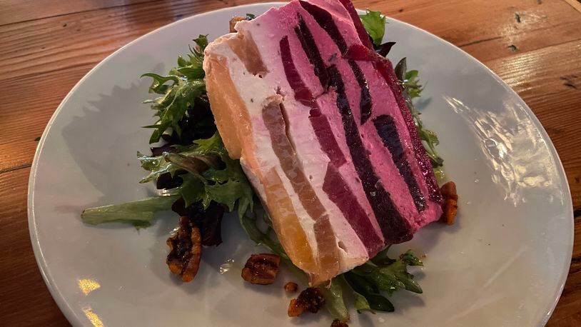 The beet terrine served at Kindred in the Oak Grove neighborhood offers softness, crunch, sweetness and tang. Angela Hansberger for The Atlanta Journal-Constitution