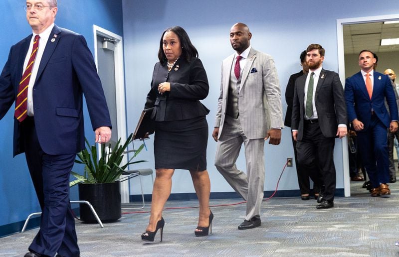 Fulton County District Attorney Fani Willis enters a press conference at Fulton County Government Center in Atlanta on Monday, August 14, 2023, following the indictment in an election interference case against former President Donald Trump and others. (Arvin Temkar / arvin.temkar@ajc.com)