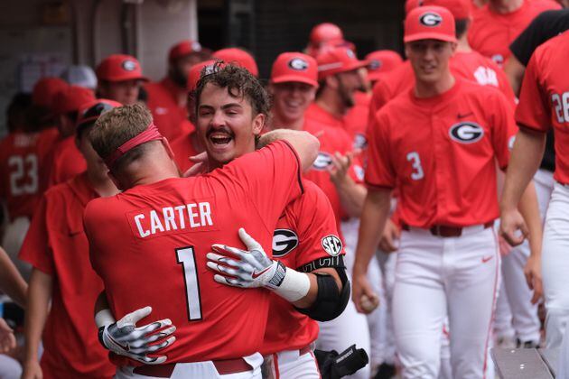 Kolby Branch (9) of Georgia celebrates his grand slam in the second inning in the game against University of North Carolina Wilmington at Foley Field Saturday June 1, 2024 in Athens. The Bulldogs won 11-2. (Nell Carroll for The Atlanta Journal-Constitution)
