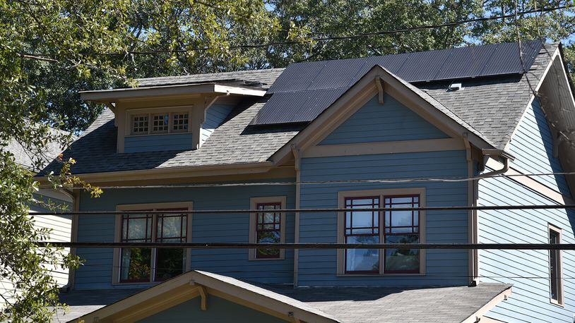This Brookhaven home is one of the few in the state where the owner used a 2015 state law to finance a solar power unit. Lawmakers are looking at tweaking the law to make it more effective. BRANT SANDERLIN/BSANDERLIN@AJC.COM