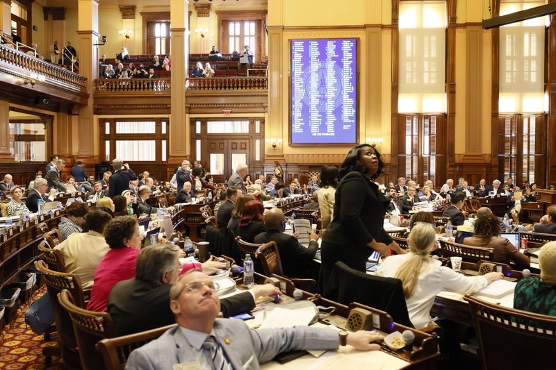 House Chamber lawmakers vote on a bill in early March. The legislative session is in its final days. (Miguel Martinez for the AJC) 