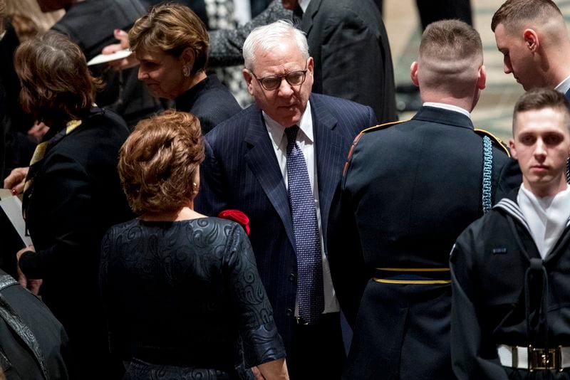 The Carlyle Group co-CEO David Rubenstein arrives for a State Funeral for former President George H.W. Bush at the National Cathedral, Wednesday, Dec. 5, 2018, in Washington. (AP Photo/Andrew Harnik, Pool)