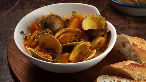 Saffron adds its beautiful fragrance to a bowl of steamed clams. (E. Jason Wambsgans/Chicago Tribune/TNS)