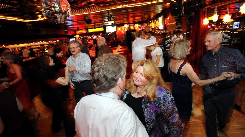 Bruce Stone and his wife, Carol Stone dance at Johnny's Hideway.