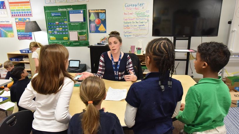 Second grade teacher Leah Owen teaches her class at Brookhaven Innovation Academy in Norcross on Thursday. The state charter school opened in 2016 and has been in a temporary facility in Norcross. But it now plans to build a permanent school building in Chamblee after securing $12 million in tax-exempt municipal bond financing. HYOSUB SHIN / HSHIN@AJC.COM