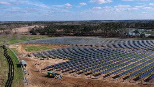 An aerial view of a solar panel array under construction in Terrell County, Ga., taken in February. HYOSUB SHIN / HSHIN@AJC.COM