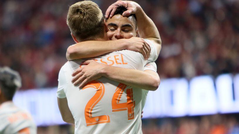 April 7, 2018.  Atlanta United Miguel Almiron #10 hugs Julian Gressel after he scored the first goal of the team.