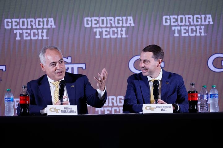 Georgia Tech President Angel Cabrera introduces new athletic director J Batt to the media on Monday. (Miguel Martinez / miguel.martinezjimenez@ajc.com)