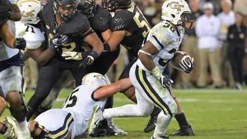 October 21, 2017 Atlanta - Georgia Tech running back KirVonte Benson (30) breaks away for a go-ahead touchdown in the second half of an NCAA college football game at Bobby Dodd Stadium on Saturday, October 21, 2017. Georgia Tech beat Wake Forest 38-24. HYOSUB SHIN / HSHIN@AJC.COM