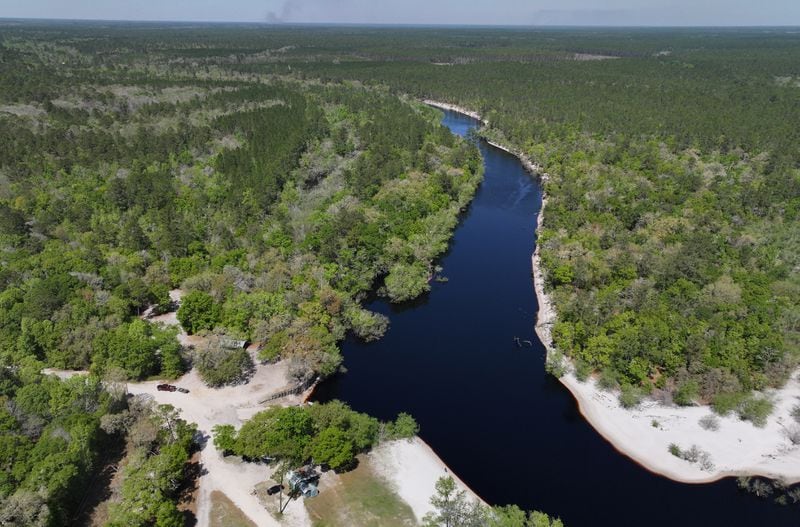 Drone photograph shows the St. Marys River in Macclenny, Florida, Wednesday, Mar. 20, 2024. The St. Marys River serves as the border between Georgia (right side) and Florida (left side). The 130-mile St. Marys River is a blackwater river located in southeast Georgia and is bordered by the Satilla River Basin to the north and the Suwannee River Basin to the west. (Hyosub Shin / Hyosub.Shin@ajc.com)
