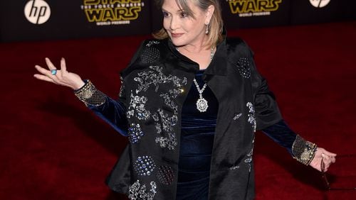 HOLLYWOOD, CA - DECEMBER 14: Actress Carrie Fisher attends the premiere of Walt Disney Pictures and Lucasfilm's 'Star Wars: The Force Awakens' at the Dolby Theatre on December 14, 2015 in Hollywood, California. (Photo by Ethan Miller/Getty Images)