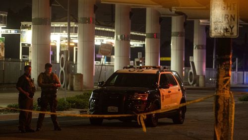 Sheriff's deputies block off streets surrounding the bus station where two Los Angeles County sheriff's deputies were shot and gravely injured on Sept. 12, 2020 in Compton, California. (Jason Armond/Los Angeles Times/TNS)