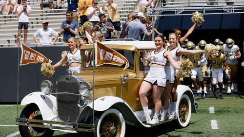 The Ramblin' Wreck leads the teams onto the field for Georgia Tech's spring football game in Atlanta on Saturday, April 15, 2023.  (Bob Andres for the Atlanta Journal Constitution)