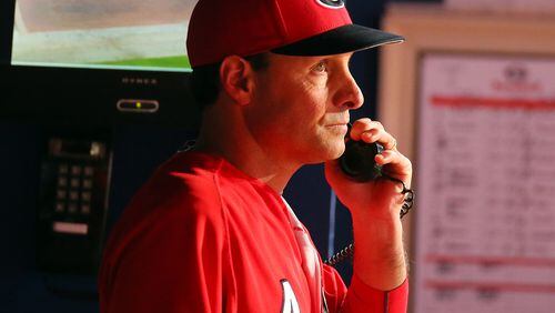 Georgia head coach David Perno makes a call to the bullpen during late inning action against Georgia Tech in the 11th Annual Kauffman Tire Spring Classic for Kids college baseball game on Tuesday, April 23, 2013, in Atlanta.