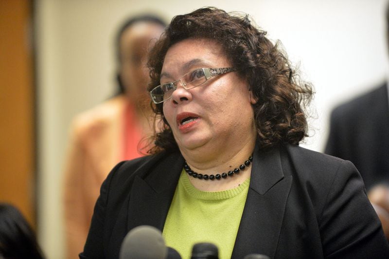 Former APS Benteen Elementary testing coordinator Theresia Copeland speaks during the press conference. Several of the former Atlanta Public Schools educators convicted and sentenced to prison, speak during a press conference at the law offices of defense attorney George Lawson Friday, April 17, 2015. KENT D. JOHNSON /KDJOHNSON@AJC.COM