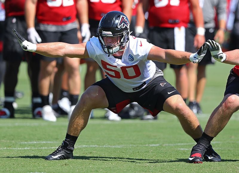 Falcons defensive end John Cominsky joins the offensive line on special teams to block for a kick during the third practice  of training camp Wednesday, July 24, 2019, in Flowery Branch.