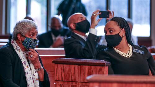 Former Atlanta Mayor Shirley  Franklin, left, speaks with state Sen. Nikema Williams before the funeral for U.S. Rep. John Lewis on July 30 in Atlanta.  Williams was chosen by the state Democratic Party to replace Lewis on the November ballot. (Alyssa Pointer/Atlanta Journal-Constitution/TNS)