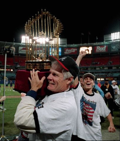 On Oct. 28, 1995, Turner celebrated the Atlanta Braves winning the World Series by parading the trophy around the infield at Atlanta-Fulton County Stadium. A few days later, he would stand atop a fire truck and lead a parade down Peachtree Street with his team. (Frank Niemeir / AJC file)