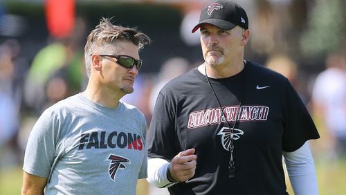 Falcons General Manager Thomas Dimitroff (left) and coach Dan Quinn.  Curtis Compton / ccompton@ajc.com