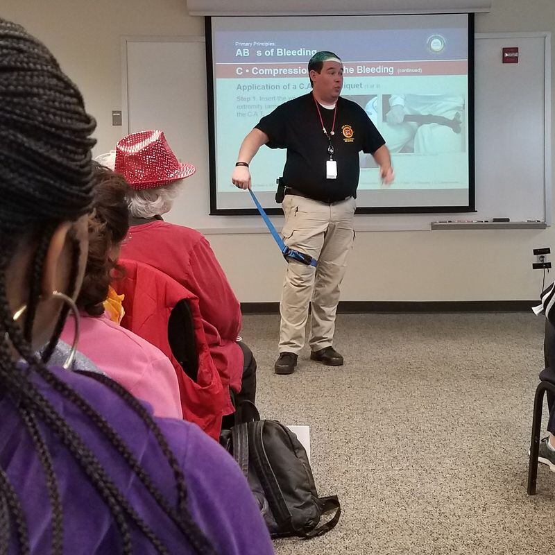 March 24, 2018: An instructor in the “Stop the Bleed” program teaches participants how to provide emergency First Aid at the DeKalb Fire and Rescue Administration. Photo: Jennifer Peebles/AJC