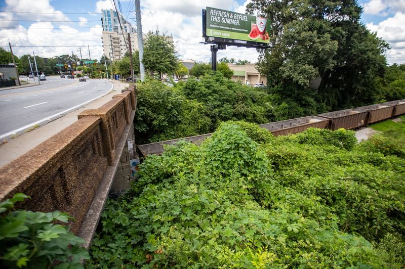 The northwest portion of the Beltline will be the final section completed. The Peachtree Road bridge here, photographed Sunday, Aug. 15, 2021, runs over an active rail line just south of Bennett Street. (Jenni Girtman for The Atlanta Journal-Constitution)