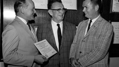 Three Pulitzer winners: Jack Nelson, right, was photographed with (from left), Eugene Patterson and Ralph McGill. Patterson, who was editor of The Atlanta Constitution in the 1960s, is holding his Pulitzer Prize citation, awarded in 1967. McGill, the crusading columnist and publisher, won it in 1959. Nelson won his Pulitzer while reporting for the Constitution a year later, in 1960.