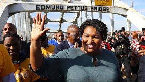 Former candidate for Georgia governor Stacey Abrams crosses the Edmund Pettus Bridge during Selma's re-enactment of Bloody Sunday on Sunday, March 1, 2020, in Selma, Alabama. Abrams is expected to mount a rematch against Gov. Brian Kemp to try to avenge her narrow defeat in 2018.  (Curtis Compton/Atlanta Journal-Constitution/TNS)
