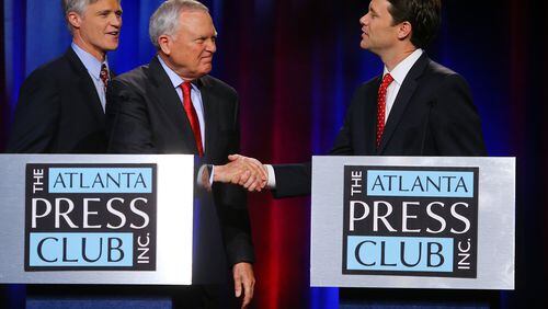 101914 ATLANTA: Libertarian candidate Andrew Hunt (from left), Governor Nathan Deal and Democrat Jason Carter conclude their second debate during The Atlanta Press Club Loudermilk-Young Debate Series at Georgia Public Broadcasting on Sunday, Oct. 19, 2014, in Atlanta. CURTIS COMPTON / CCOMPTON@AJC.COM In both this debate last week and one last night, Nathan Deal and Jason Carter assailed each other on their education records.