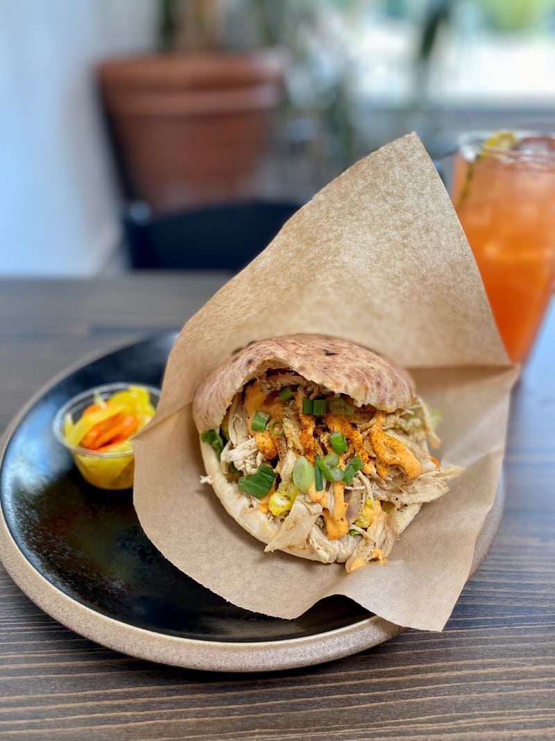 You can get a rotisserie chicken pita at Daily Chew. Wendell Brock for The Atlanta Journal-Constitution