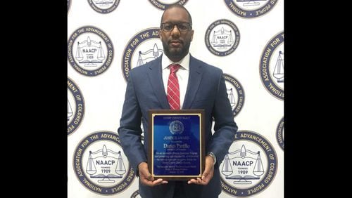 Henry DA Darius Pattillo has received the county NAACP's justice award.