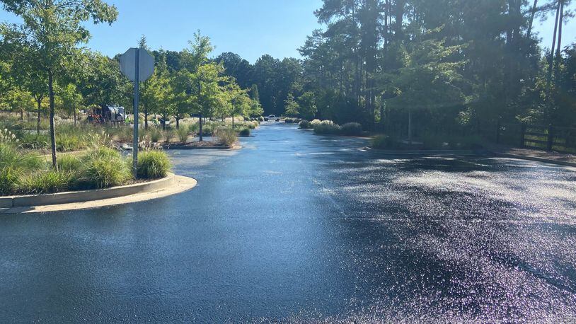 Milton recently approved and completed adding a high-density mineral bond surface treatment and new striping to the parking lot at Bell Memorial Park. COURTESY CITY OF MILTON