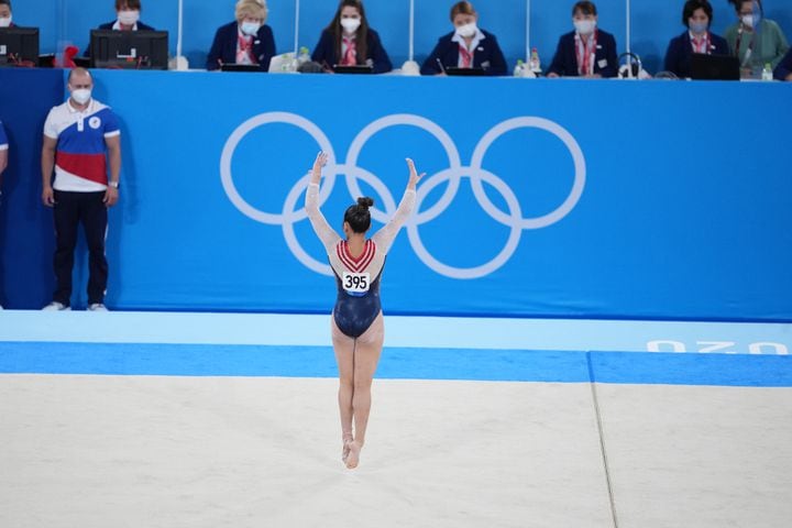 Sunisa Lee of the United States performs her floor routine during the women's all-around gymnastics competition at the postponed 2020 Tokyo Olympics in Tokyo on Thursday, July 29, 2021. She went on to win the gold medal. (Chang W. Lee/The New York Times)