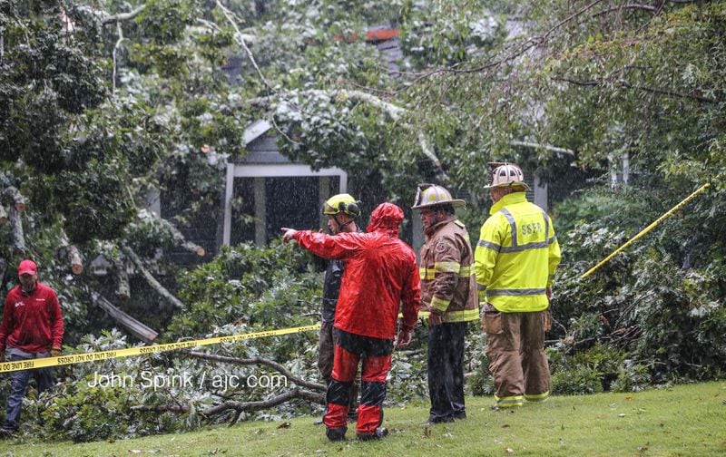 A 55-year-old Sandy Springs man was killed when a tree crashed into his home. JOHN SPINK/AJC