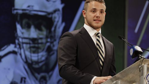 Georgia Tech's Brant Mitchell answers a question during a news conference at the NCAA Atlantic Coast Conference college football media day in Charlotte, N.C., Wednesday, July 18, 2018. (AP Photo/Chuck Burton)