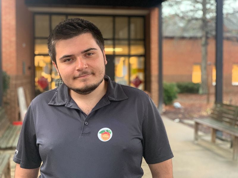 Alexander Woodall said he was motivated to stop abortions, saying he supported Republican Herschel Walker after voting at Dowell Elementary School in Cobb County.