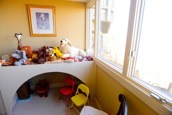 "Cave" bed in grandkids' playroom