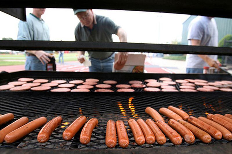 Before the night is over, Wesleyan booster club would have grilled over 400 hot dogs and 250 hamburgers.