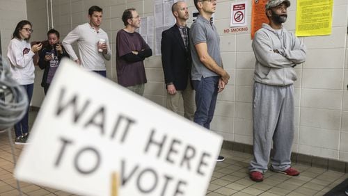 Voters lined up early at Henry W. Grady High School in Atlanta on Tuesday. JOHN SPINK/JSPINK@AJC.COM AJC FILE PHOTO