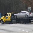 Footage from the day police discovered the bodies shows the Dodge Charger tied to the scene being towed away.
