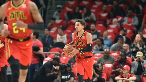 Atlanta Hawks guard Trae Young (11)  during the home opener against the Dallas Mavericks  at State Farm Arena on Wednesday.