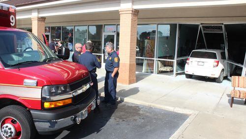 A car crashed into a Cherokee County business Thursday. (Credit: Cherokee County Fire and Emergency Services)
