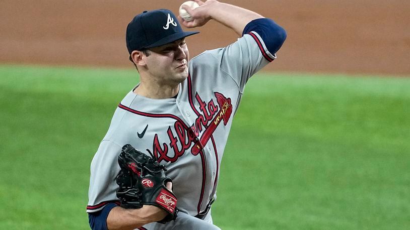 Braves starting pitcher Jared Shuster throws to the Texas Rangers in the first inning of a baseball game, Tuesday, May 16, 2023, in Arlington, Texas. (AP Photo/Tony Gutierrez)